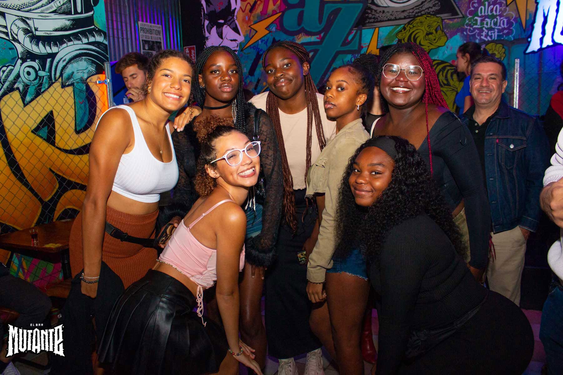 Friends posing together during a night out